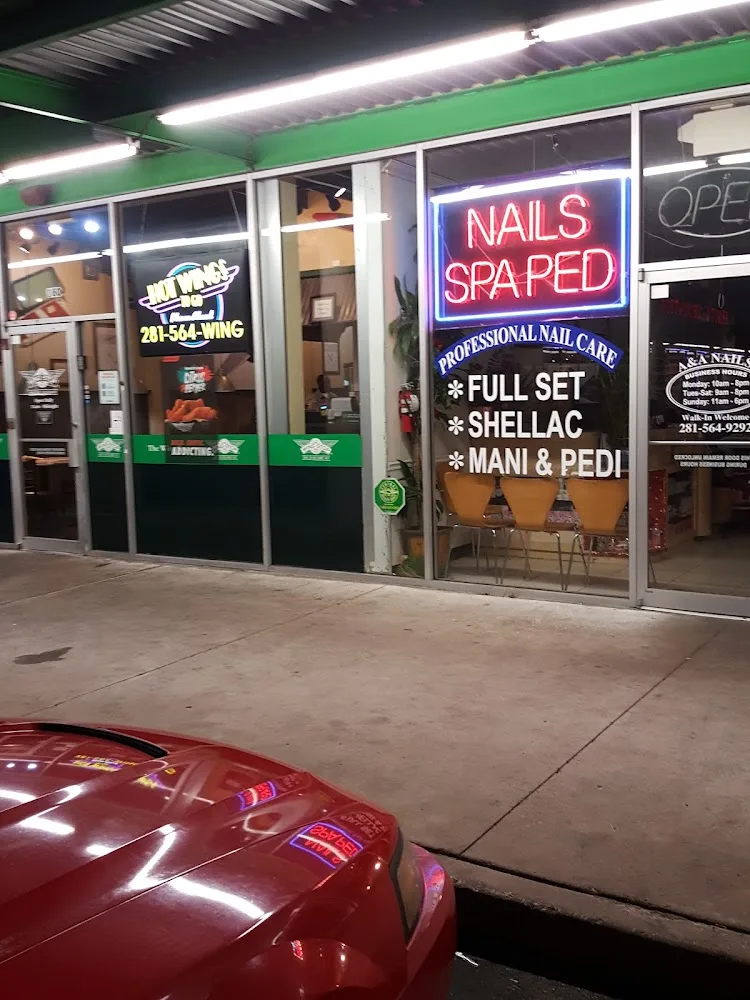 Wingstop food and storefront view at 10100 Beechnut St Ste 180 in Houston, Texas