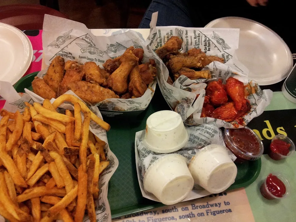 Wingstop food and storefront view at 6858 Harrisburg Blvd in Houston, Texas