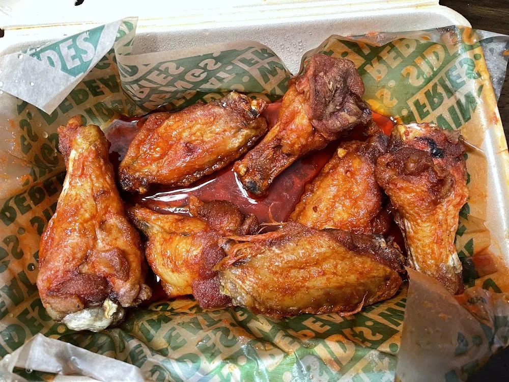Wingstop food and storefront view at 7611 FM 1960 Rd E in Humble, Texas
