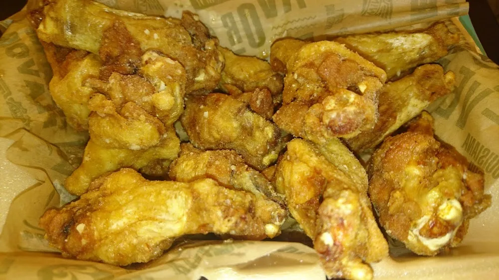 Wingstop food and storefront view at 7611 FM 1960 Rd E in Humble, Texas