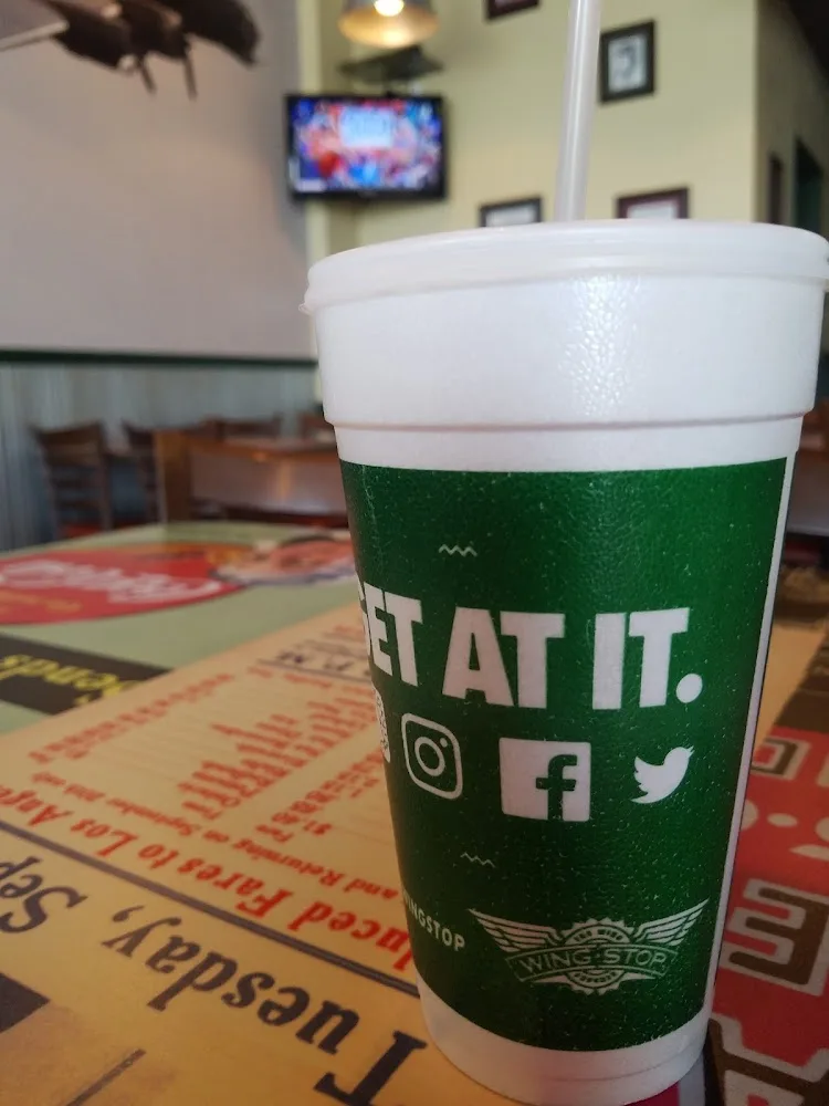 Wingstop food and storefront view at 522 E Pipeline Rd in Hurst, Texas