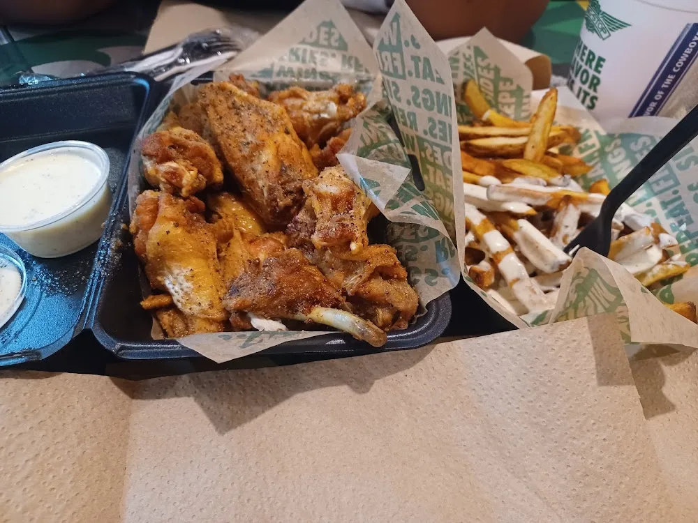 Wingstop food and storefront view at 963 E Irving Blvd in Irving, Texas