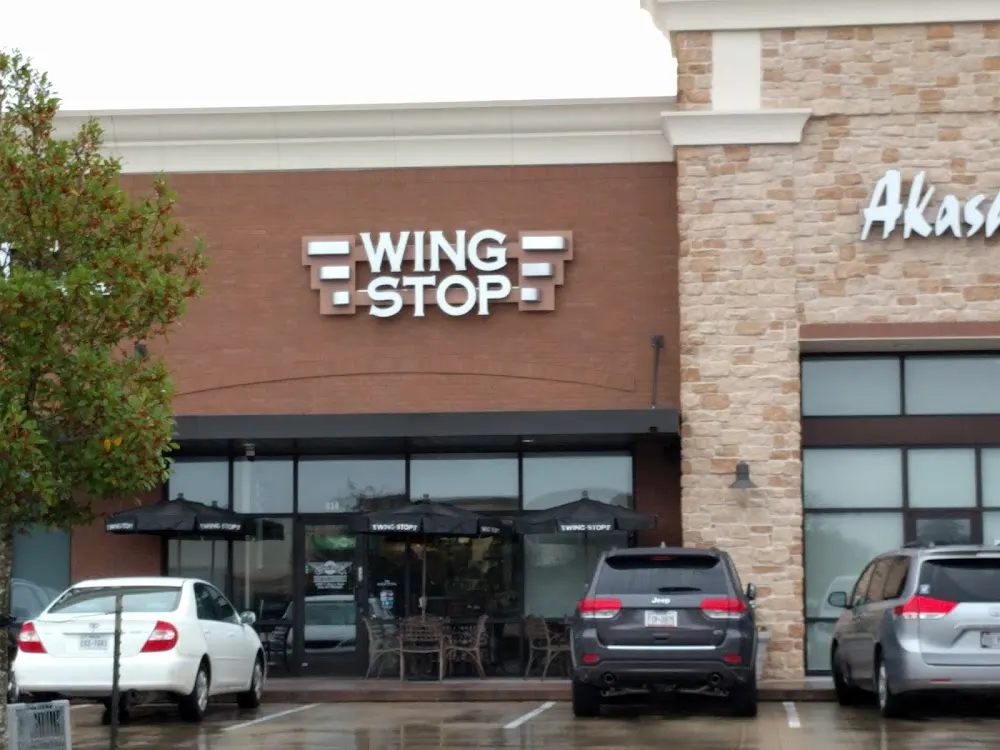 Wingstop food and storefront view at 9550 Spring Green Blvd Ste 414 in Katy, Texas