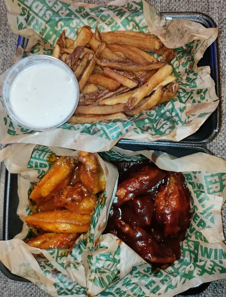 Wingstop food and storefront view at 5502 N Fry Rd Ste F in Katy, Texas