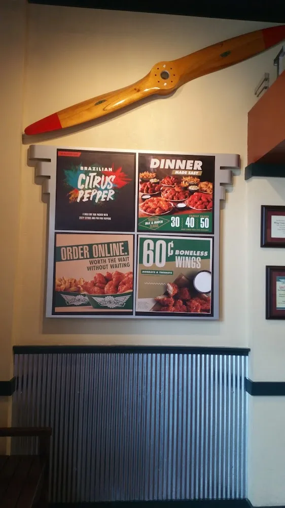 Wingstop food and storefront view at 1998 Katy Mills Blvd Ste B in Katy, Texas