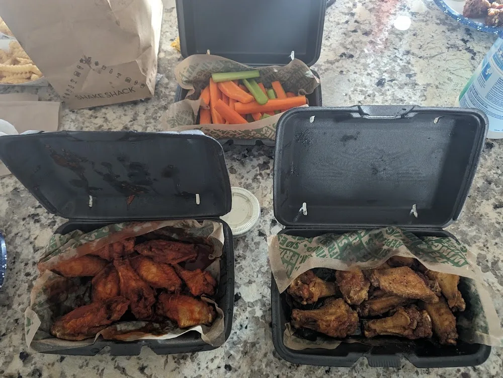 Wingstop food and storefront view at 1998 Katy Mills Blvd Ste B in Katy, Texas