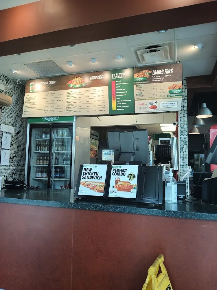 Wingstop food and storefront view at 1310 General Cavazos Blvd Ste G in Kingsville, Texas