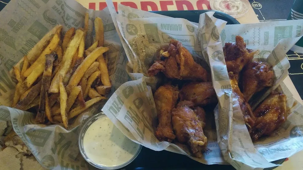 Wingstop food and storefront view at 117 TX-332 W in Lake Jackson, Texas