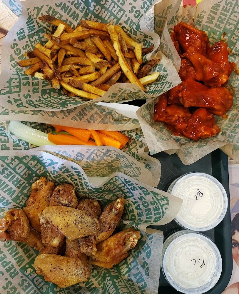 Wingstop food and storefront view at 2420 Bob Bullock Loop Ste 20 in Laredo, Texas