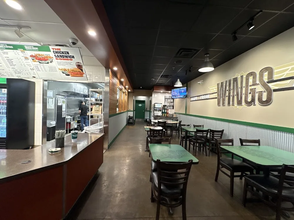 Wingstop food and storefront view at 19372 Ronald Reagan Blvd in Leander, Texas