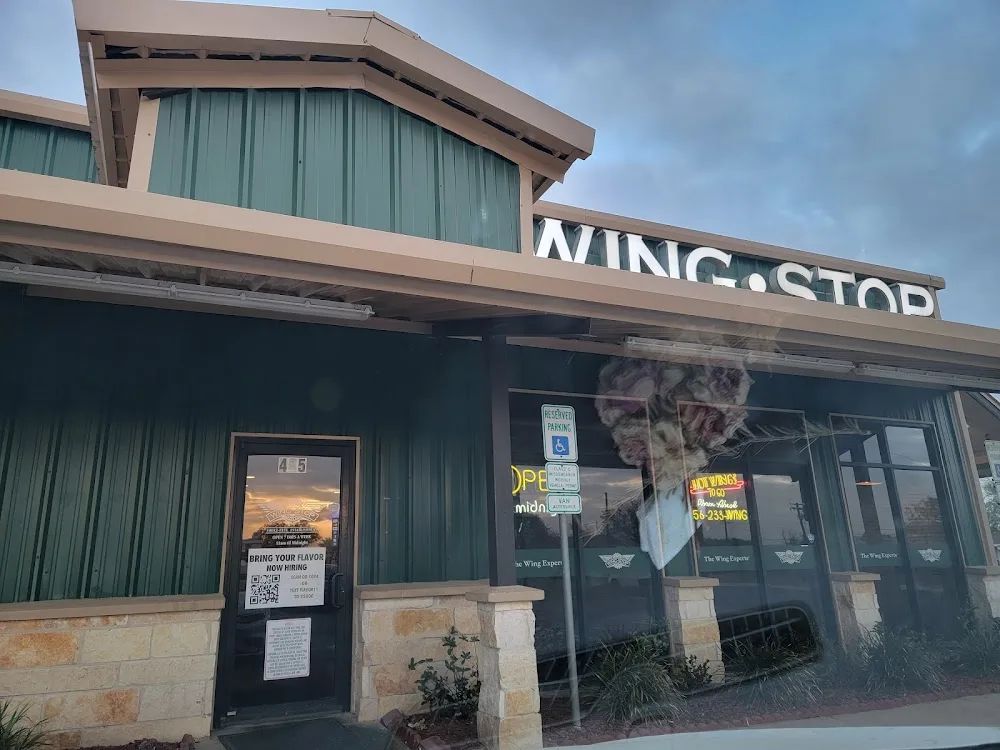Wingstop food and storefront view at 405 E Ocean Blvd in Los Fresnos, Texas