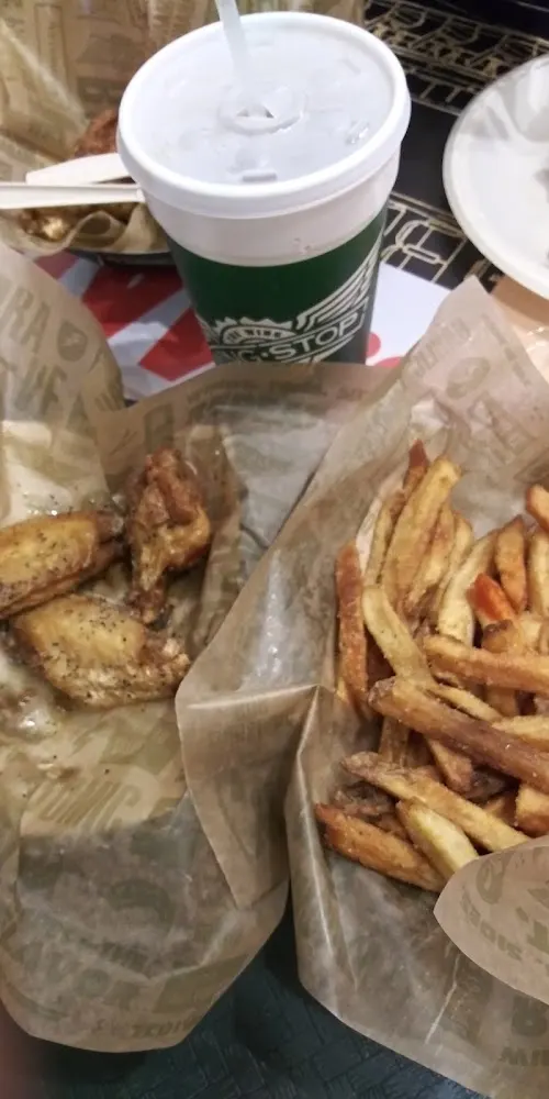 Wingstop food and storefront view at 2430 S. High Street in Longview, Texas