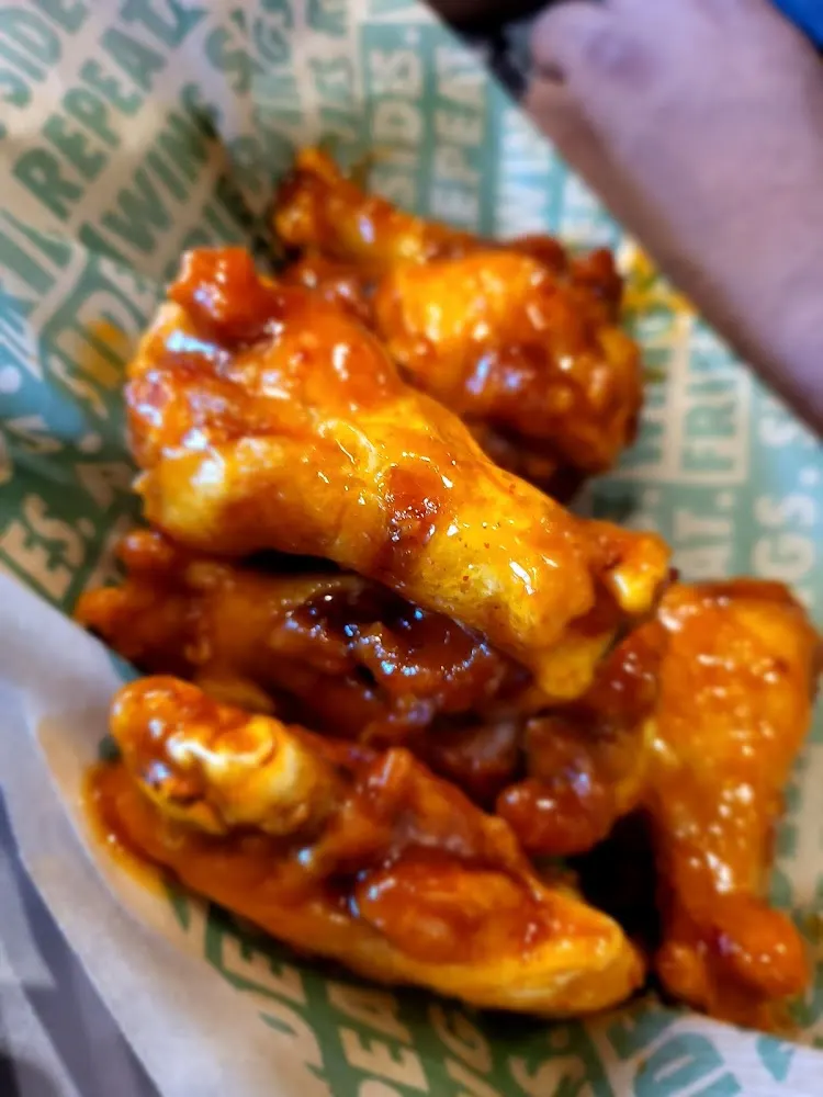 Wingstop food and storefront view at 2508 N. US Highway 281 Suite 125 in Marble Falls, Texas