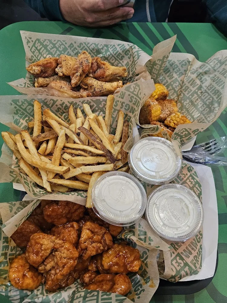 Wingstop food and storefront view at 1308 E Expressway 83 in Mcallen, Texas