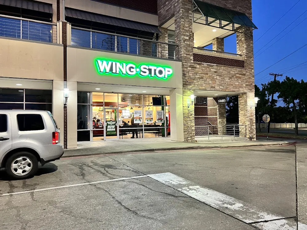 Wingstop food and storefront view at 1515 N Town East Blvd Ste 104 in Mesquite, Texas