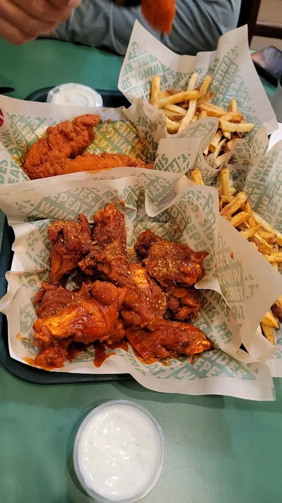 Wingstop food and storefront view at 937 FM 1821 in Mineral Wells, Texas