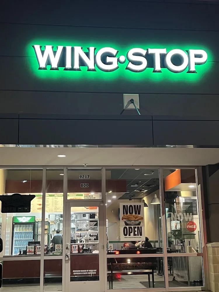 Wingstop food and storefront view at 9217 Eagle Drive in Mont Belvieu, Texas