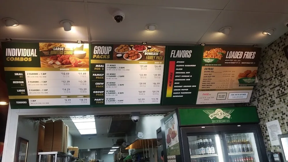 Wingstop food and storefront view at 1613 N County Rd W Ste D in Odessa, Texas