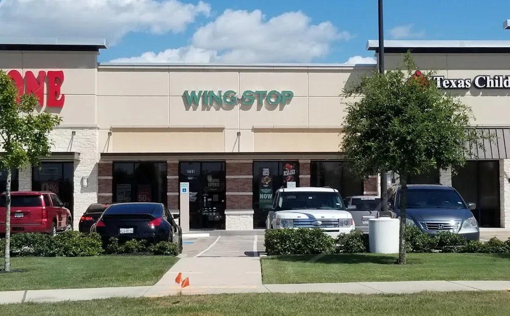Wingstop food and storefront view at 2701 Pearland Parkway Suite 170 in Pearland, Texas