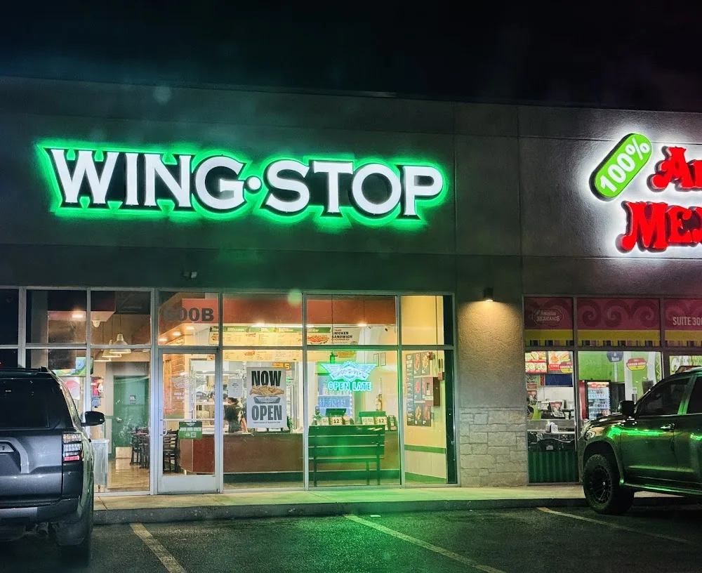 Wingstop food and storefront view at 1511 E. Nolana Loop in Pharr, Texas