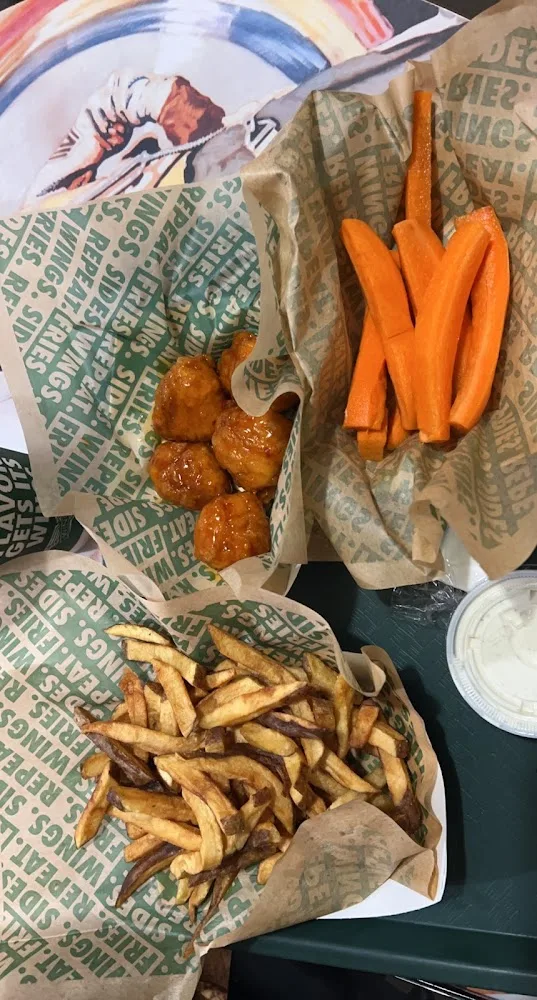 Wingstop food and storefront view at 8001 S. Jackson Rd. Ste 6 in Pharr, Texas