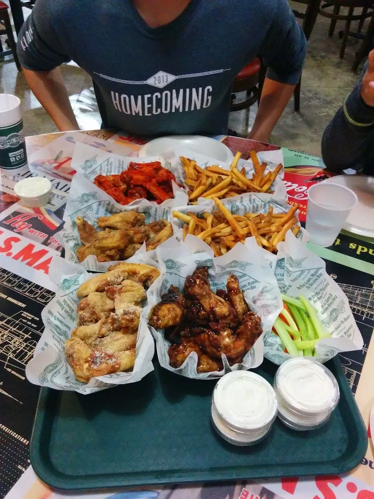 Wingstop food and storefront view at 2929 Custer Rd in Plano, Texas