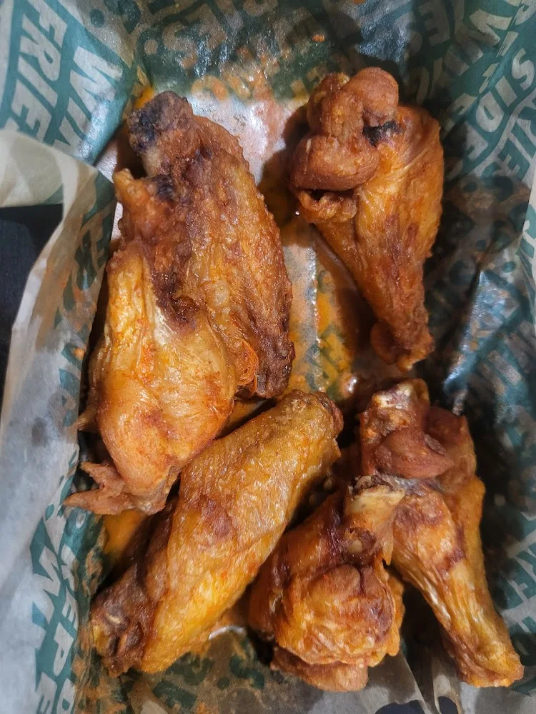 Wingstop food and storefront view at 102 E Ovilla Rd Ste 200 in Red Oak, Texas