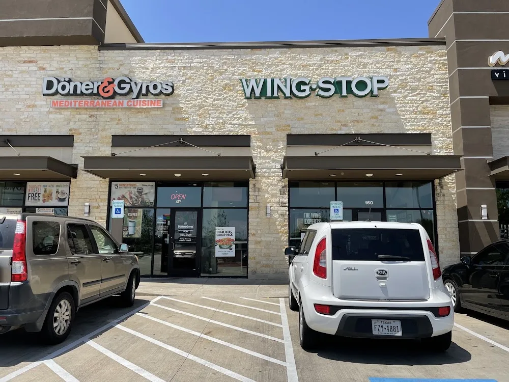Wingstop food and storefront view at 5400 Pointe West Circle Ste 160 in Richmond, Texas