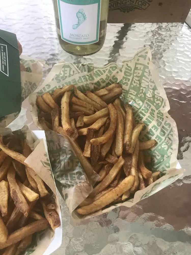 Wingstop food and storefront view at 900 N Coit Rd suite 2700 in Richardson, Texas