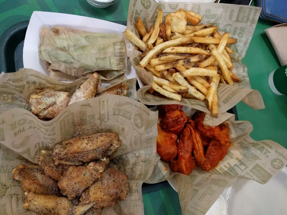 Wingstop food and storefront view at 908 Audelia Rd Ste 600 in Richardson, Texas