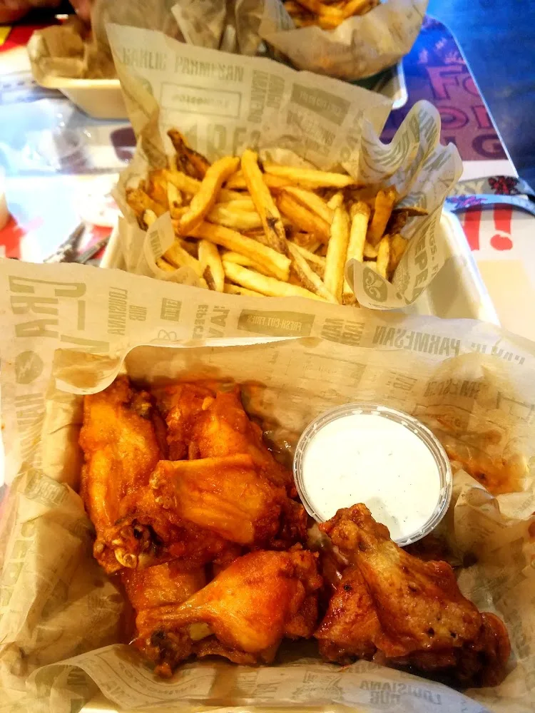 Wingstop food and storefront view at 4570 E Highway 83 Ste 8 in Rio Grande City, Texas