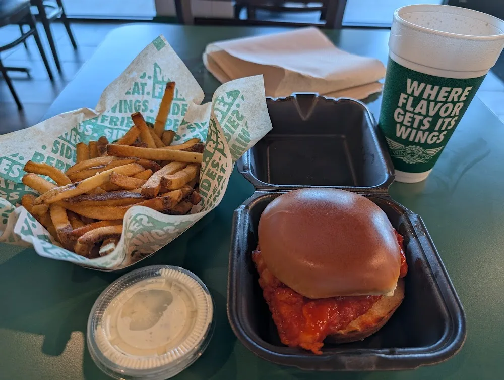 Wingstop food and storefront view at 6310 Dalrock Rd in Rowlett, Texas