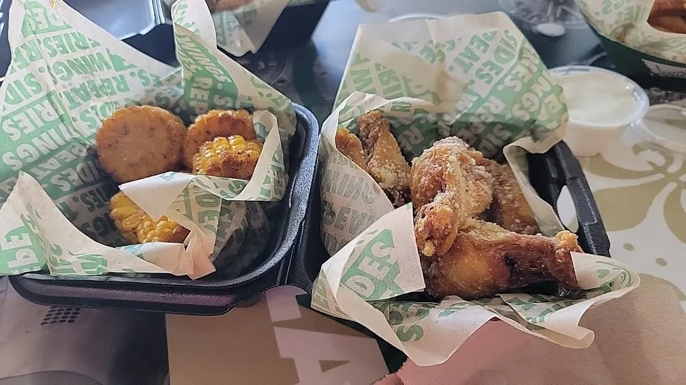 Wingstop food and storefront view at 5250 TX-78 #800 in Sachse, Texas