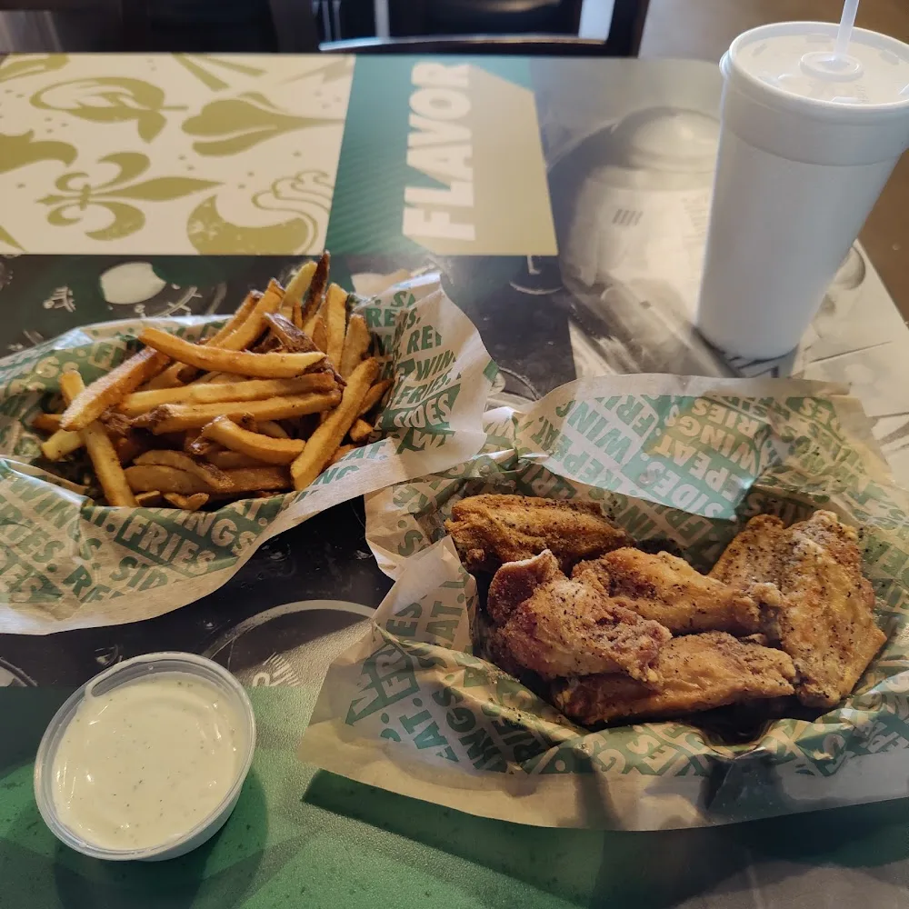 Wingstop food and storefront view at 614 W. 29th St. Ste 110 in San Angelo, Texas