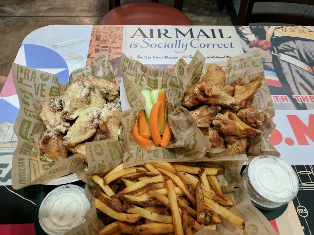 Wingstop food and storefront view at 502 Embassy Oaks Ste 126 in San Antonio, Texas