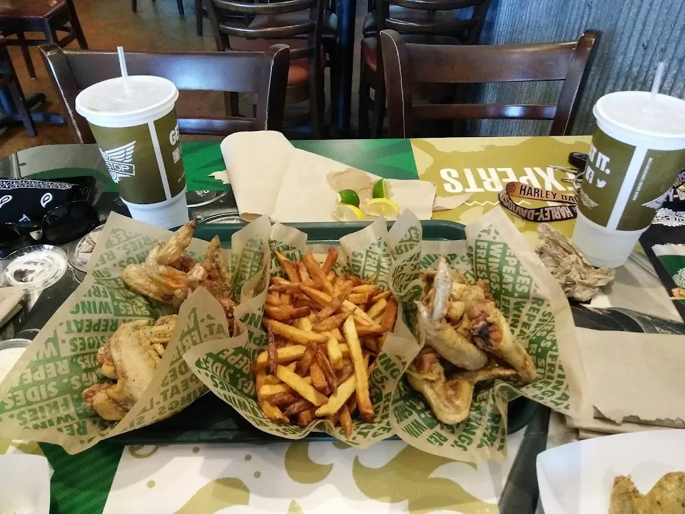 Wingstop food and storefront view at 4622 W Commerce St Ste 102 in San Antonio, Texas