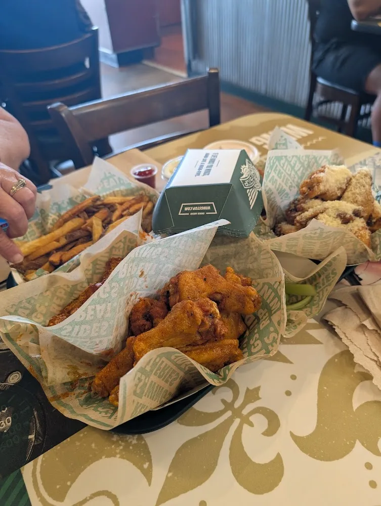 Wingstop food and storefront view at 3031 W. Woodlawn Ave. Ste. 107 in San Antonio, Texas