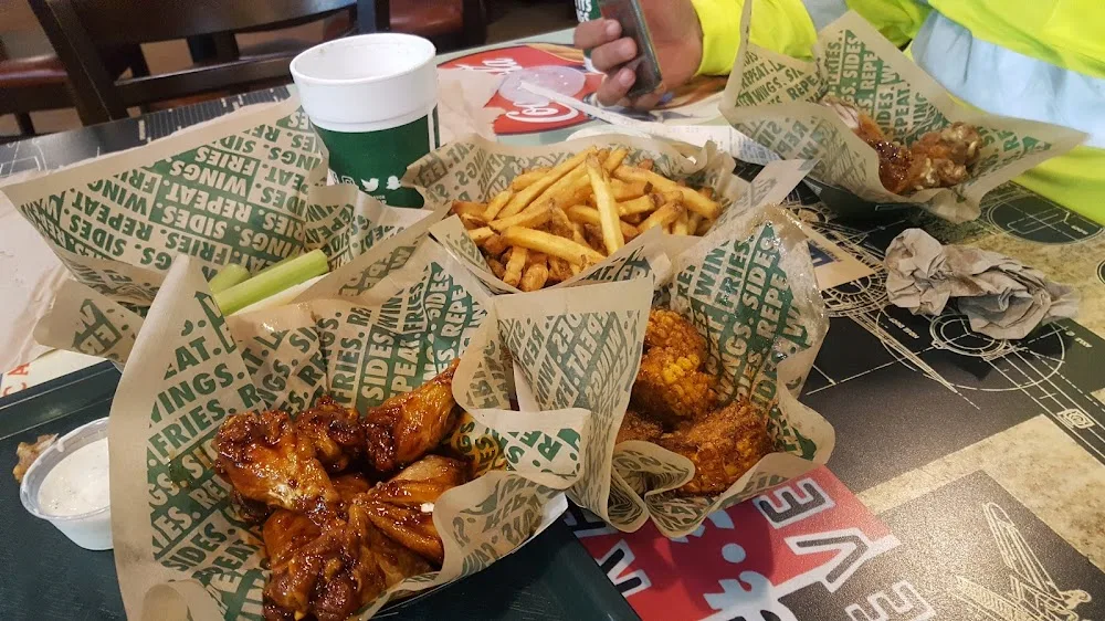 Wingstop food and storefront view at 4130 S New Braunfels Ave Ste 107 in San Antonio, Texas