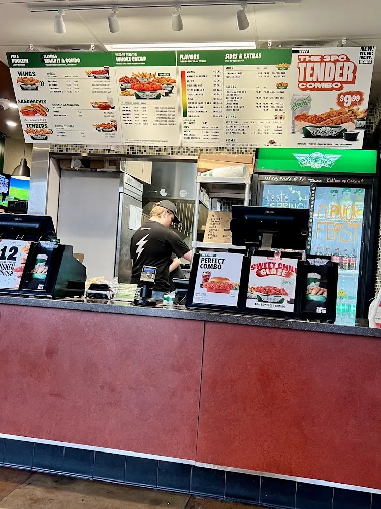 Wingstop food and storefront view at 651 Barnes Drive in San Marcos, Texas