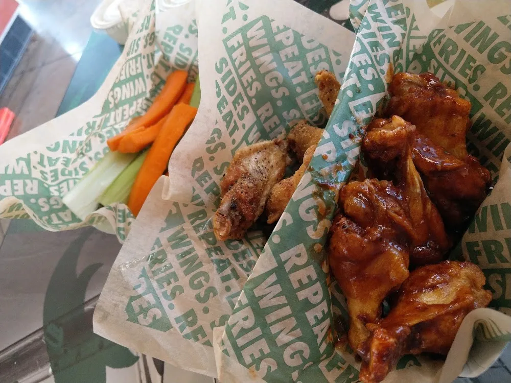 Wingstop food and storefront view at 6044 FM 3009 Ste 280 in Schertz, Texas