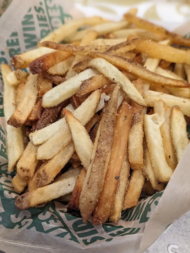 Wingstop food and storefront view at 2222 Rayford Rd. Ste. 106 in Spring, Texas