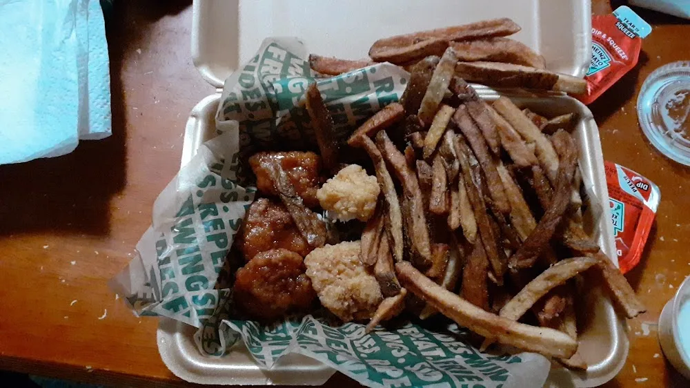 Wingstop food and storefront view at 1602 S Broadway St in Sulphur Springs, Texas