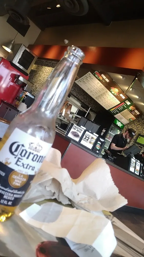 Wingstop food and storefront view at 4501 N State Line Ave Ste 106 in Texarkana, Texas