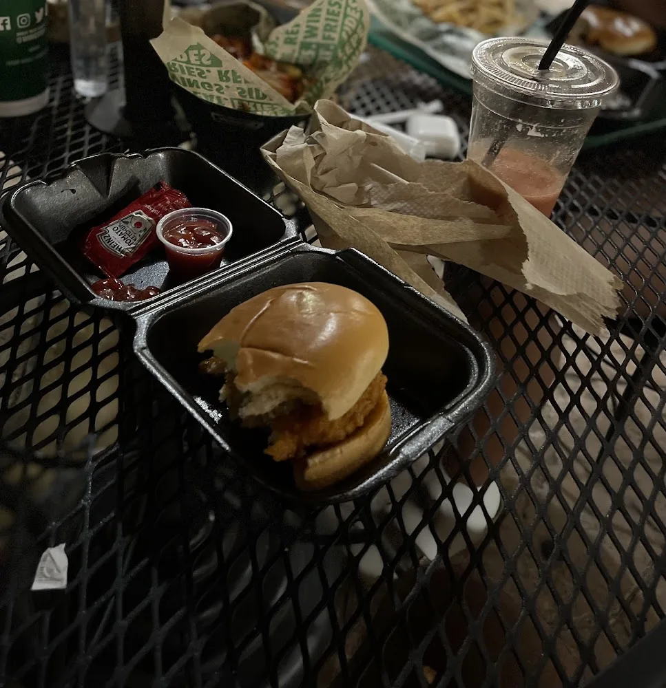 Wingstop food and storefront view at 6777 Woodlands Pkwy Ste 324 in The Woodlands, Texas