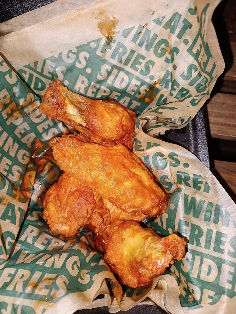 Wingstop food and storefront view at 3401 Palmer Hwy in Texas City, Texas