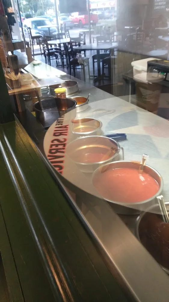 Wingstop food and storefront view at 510 Sawdust Rd Ste 201 in The Woodlands, Texas