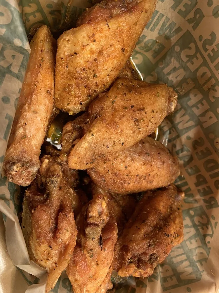 Wingstop food and storefront view at 2210 TX-114 in Trophy Club, Texas
