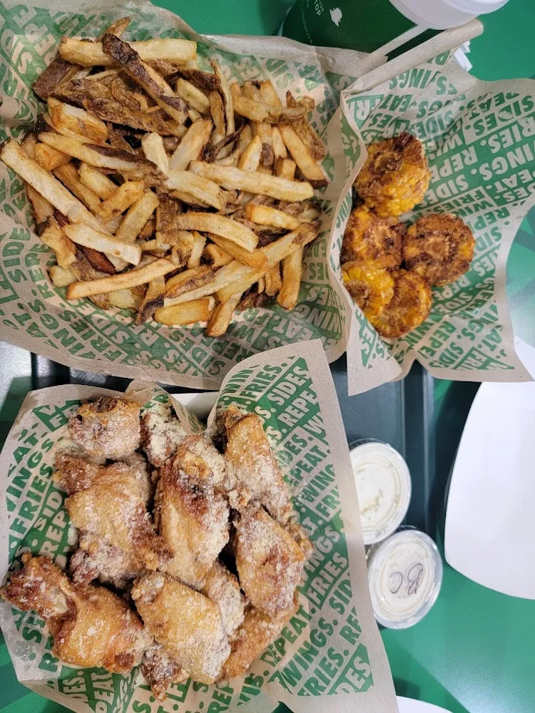 Wingstop food and storefront view at 2921 Pat Booker Rd Ste 116 in Universal City, Texas