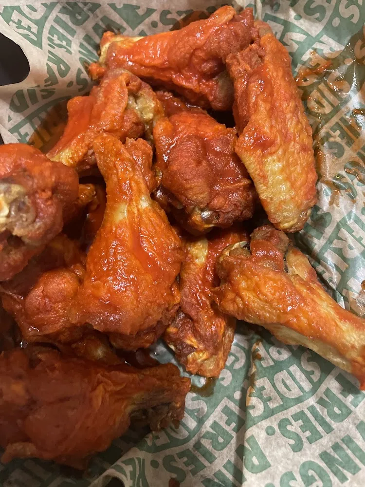 Wingstop food and storefront view at 111 S New Rd in Waco, Texas