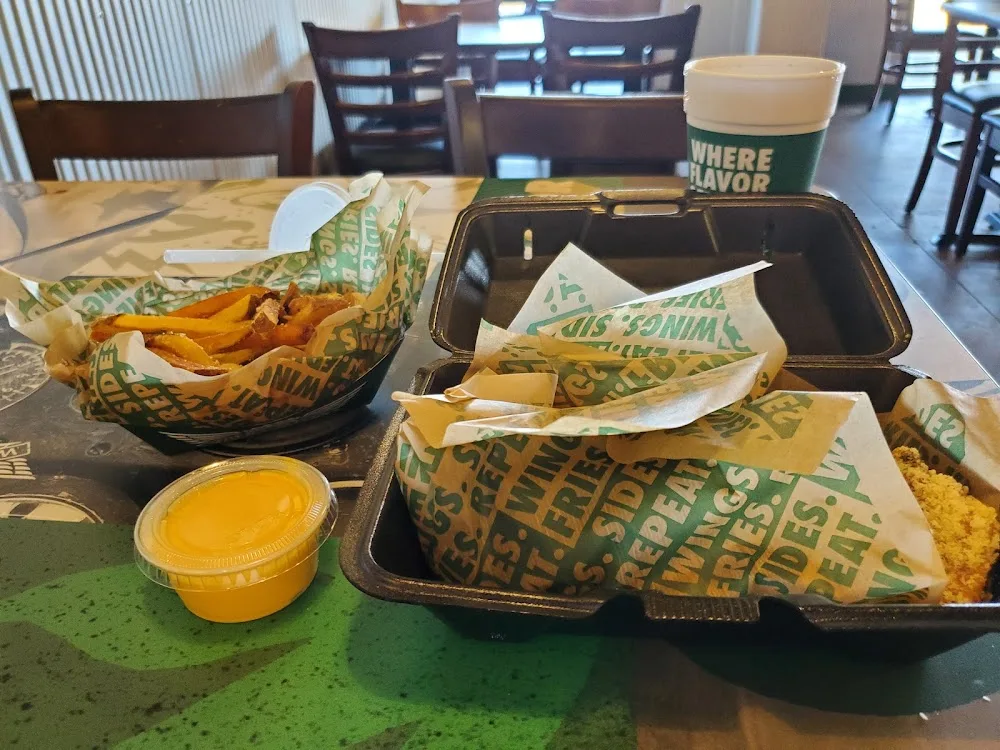 Wingstop food and storefront view at 1201 Hewitt Dr Ste 211A in Waco, Texas